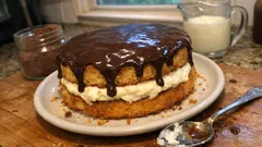 Nadýchaný kakaový dort s mascarpone krémem a čokoládovou polevou