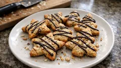 Křehké vánoční sušenky s mandlemi: hvězdičky a stromečky, které se krásně povedou